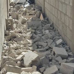 Daños a vivienda y obra en construcción ocasionado por la caída de una barda